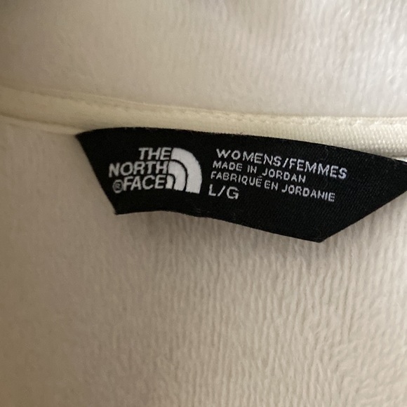The north face cream color zip up jacket with front side pockets. 27 inches long - Picture 2 of 6
